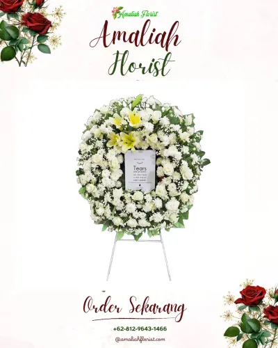 Krans Bunga Duka Cita di Sei Kera Hilir Ii